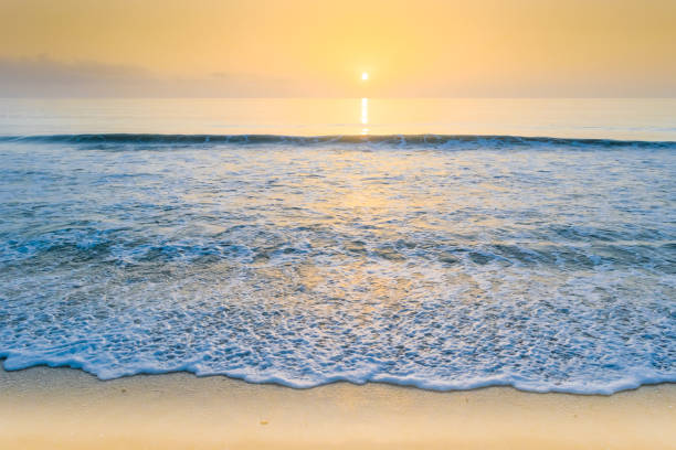 The morning sun rises over the Atlantic Ocean near St. Augustine, Florida.